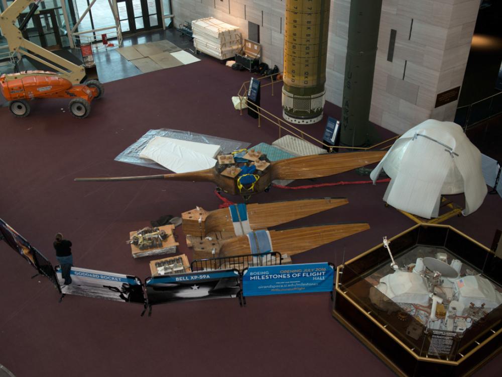 Parts of a large wind tunnel fan sit on the floor of the Museum prior to reconstruction.