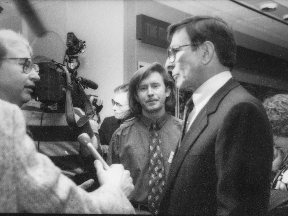 Leonard Nimoy, a white man, visits the opening of the Museum's Star Trek Exhibit in 1992. A member of museum staff is with him to escort Nimoy to museum events.