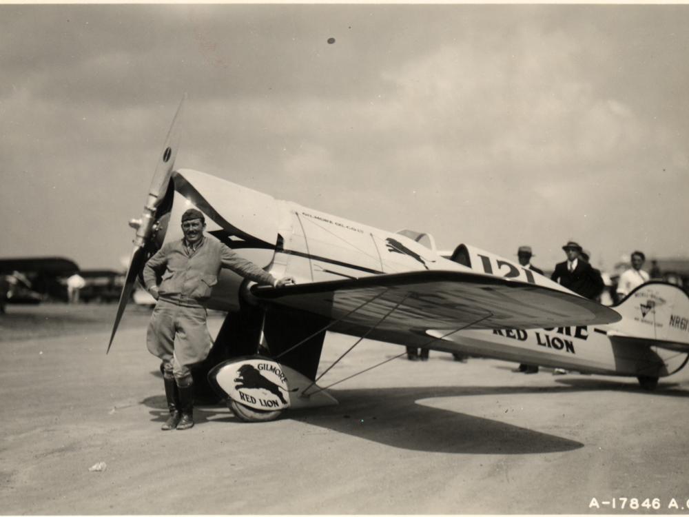 Col. Roscoe Turner Posing with Racer