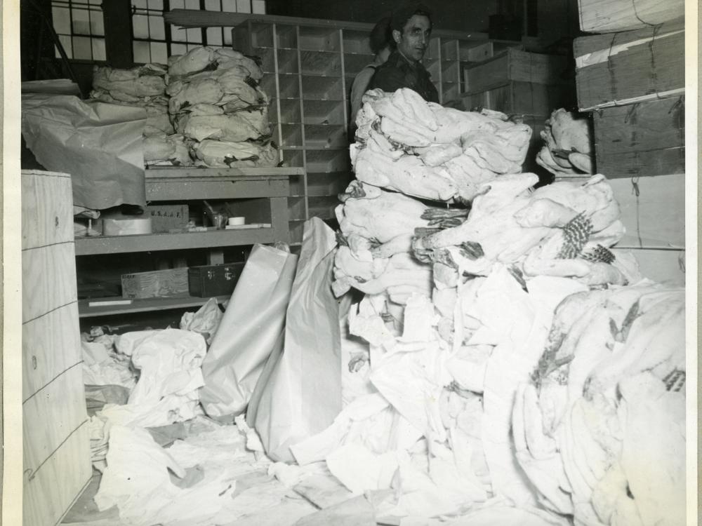 View of several turkeys stacked as part of the Northwest Aeronautical Corporation's giveaway during the 1945 holiday season.