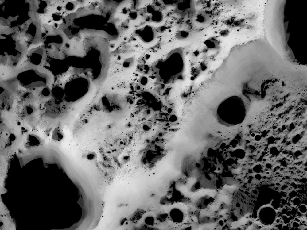 Map of the north pole region of the Moon, revealing which areas of the region receive the least amount of sunlight compared to other areas.