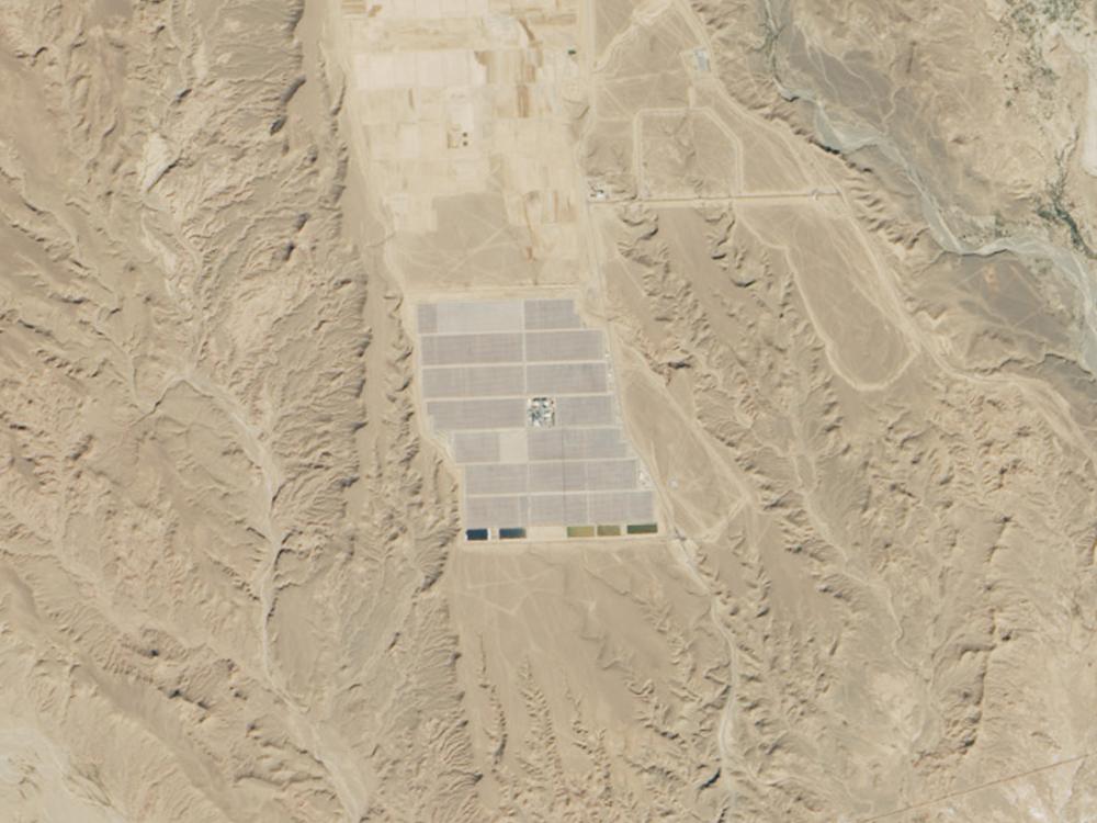 Satellite view of a solar power plant in a large desert in Morocco.