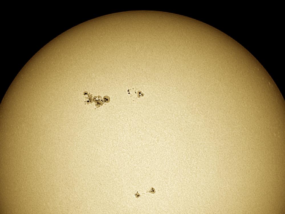 Partial disk view of the Sun highlighting a sunspot which has transformed into a solar flare.