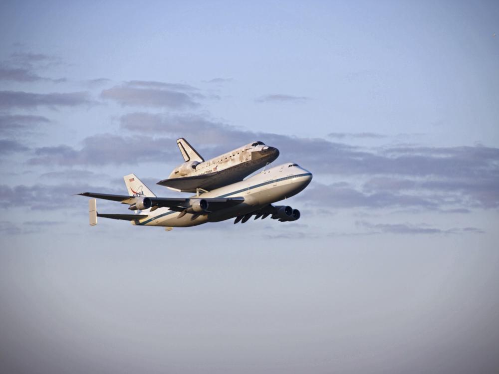 Space Shuttle Discovery Leaves Kennedy Space Center