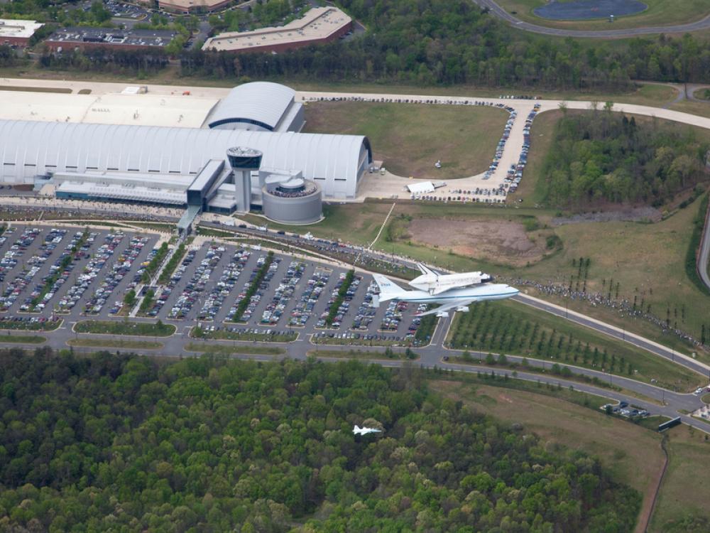 Space Shuttle Discovery Flies over the Udvar-Hazy Center prior to its delivery to the Udvar-Hazy Center.