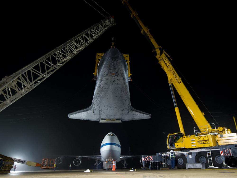 The Space Shuttle Discovery is unattached from the modified Boeing 747 used to transport the shuttle.