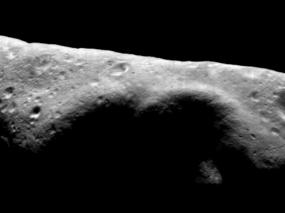A mosaic view of a oblong-shaped asteroid.