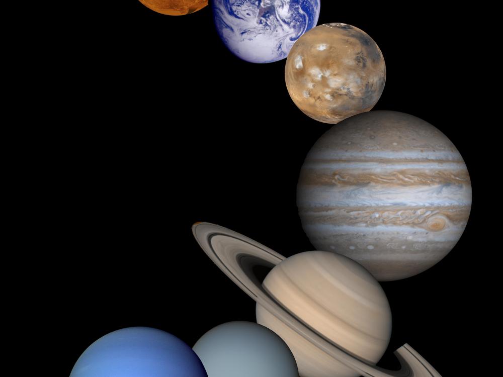 A collage of all of the important components -- moons, planets, and the Sun -- lined up together.