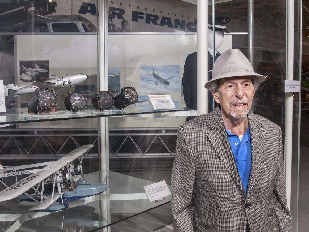 Bruce Del Mar with Donated Artifacts