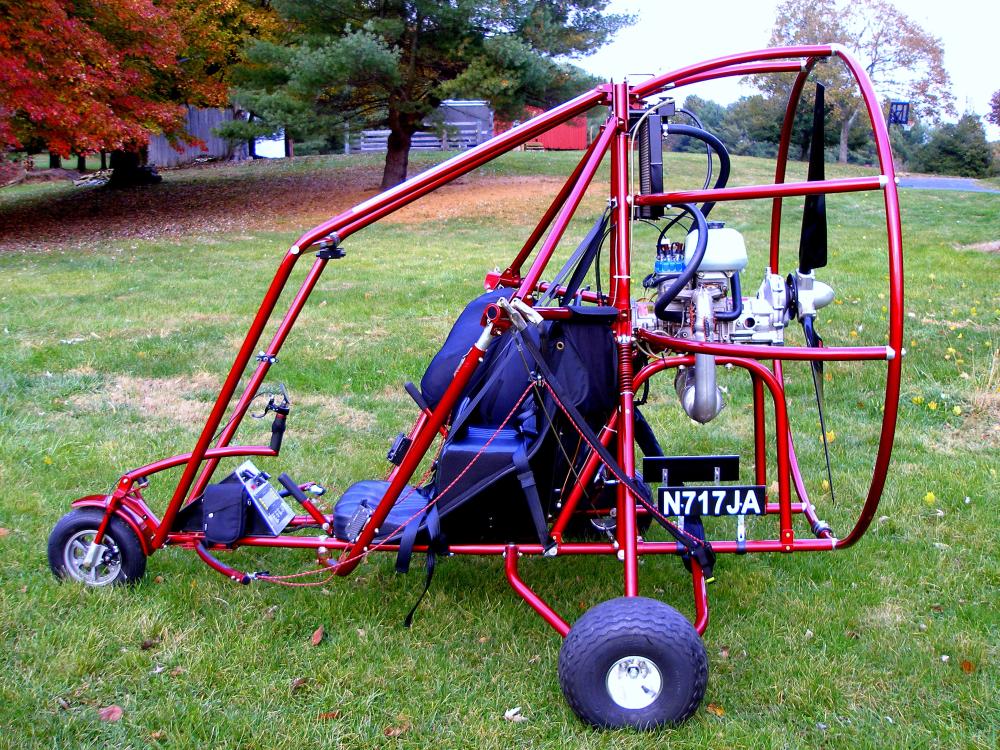 Side view of engine cage and seat for an engine-powered parachute.