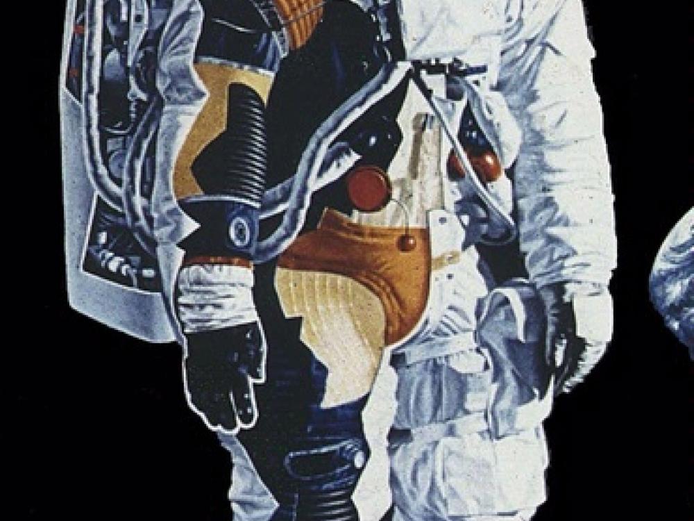 Diagram with a cutaway revealing the interior contents of the Apollo spacesuit. Multiple materials and colors are found under the white outer base.