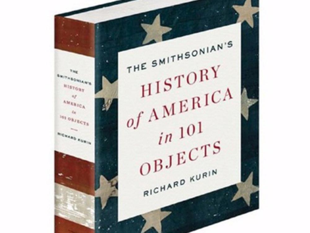 Book cover for a book about American objects with the blue and white section of the U.S. flag as a backdrop.