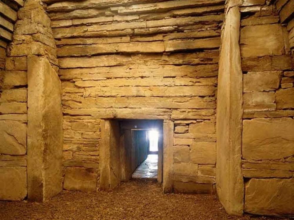 A sunset viewed inside an ancient tomb in Scotland.