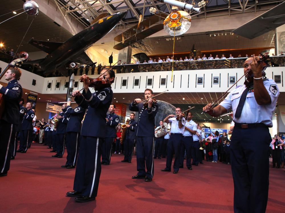 A group of musicians who are part of the U.S. Air Force perform unexpectedly at the Museum.