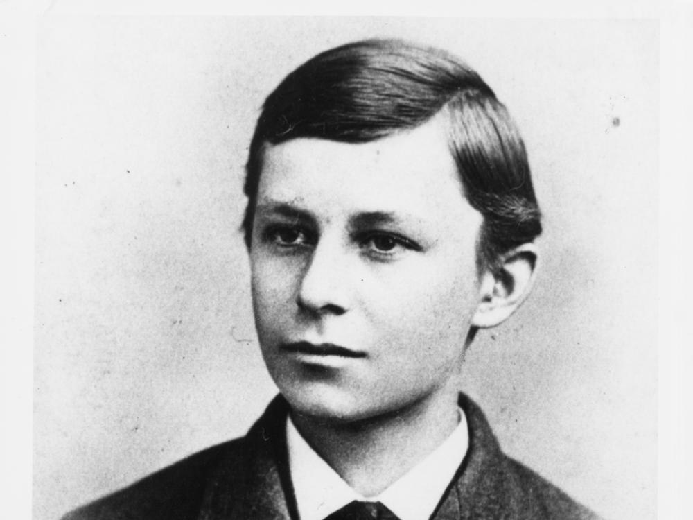 Black and white portrait of a young man.