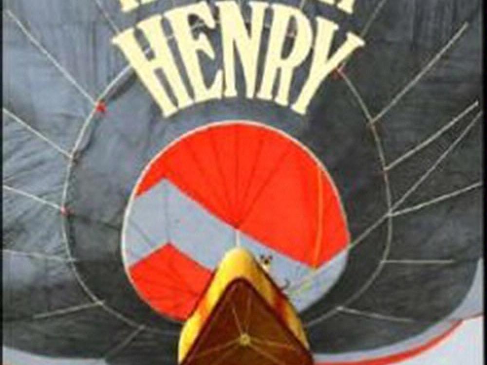 Book cover for a children's book about hot air balloons featuring an illustration of a bottom-up view of a hot air balloon.