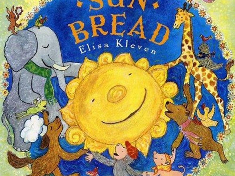 Book cover for a book about the Sun with an illustration of various anthropomorphic animals holding hands in a circle around the Sun.