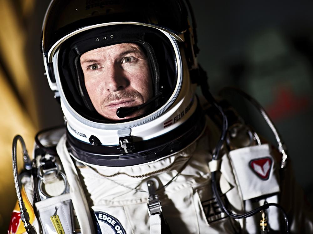 Felix Baumgartner, a white man, wearing a high-altitude flight suit.