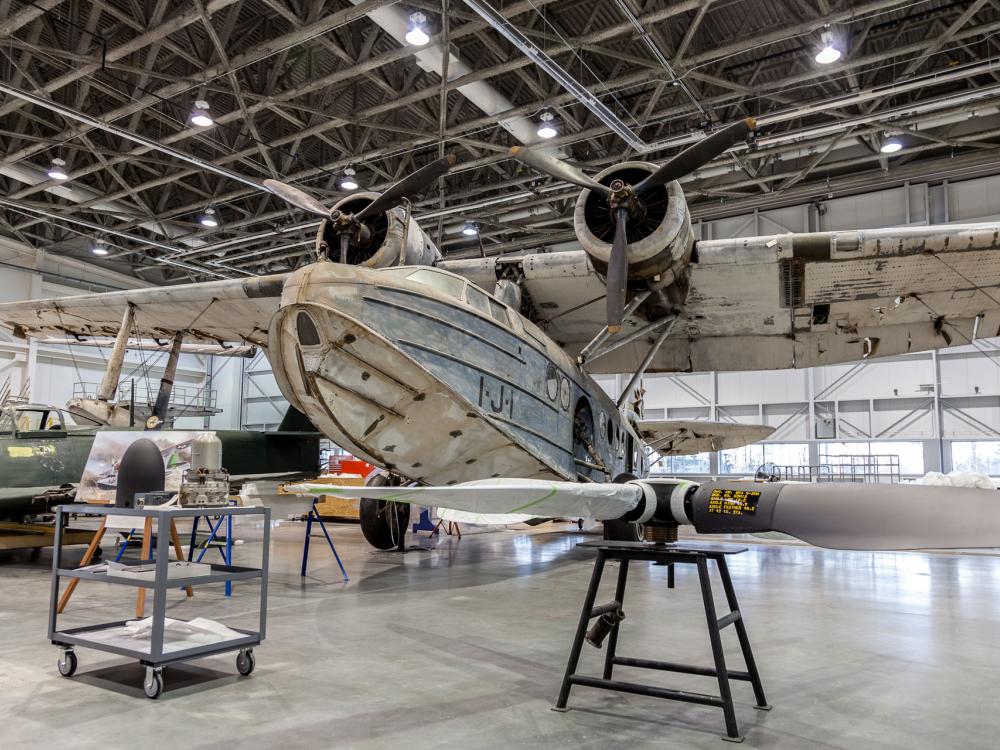 A monoplane with two twin engines sits in the Museum's restoration hangar, where it receives work to refurbish the aircraft prior to its display in the Museum.