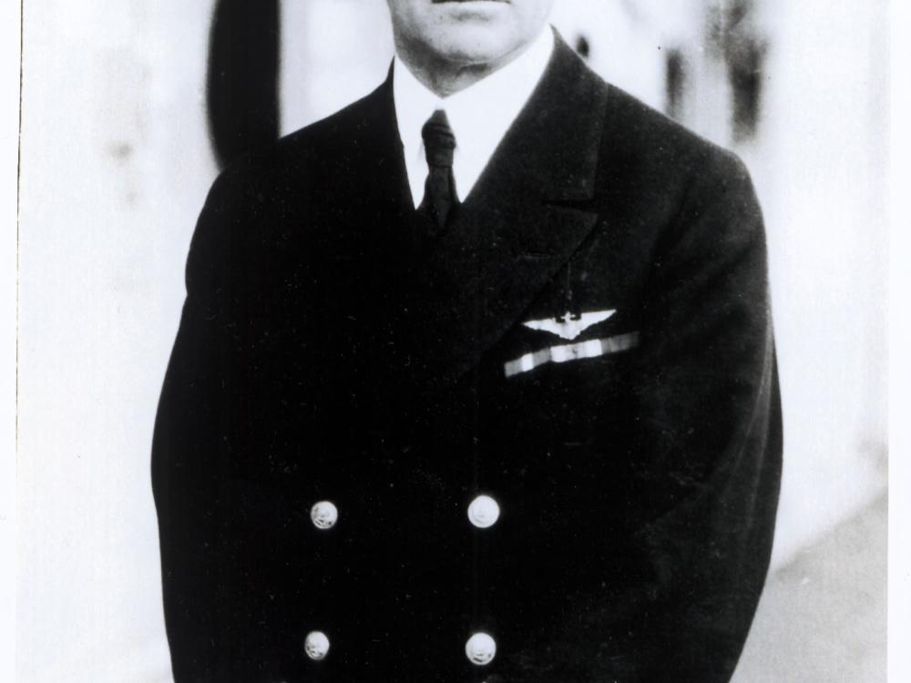 Kenneth Whiting, a white male, poses for a portrait wearing his U.S. Navy uniform.