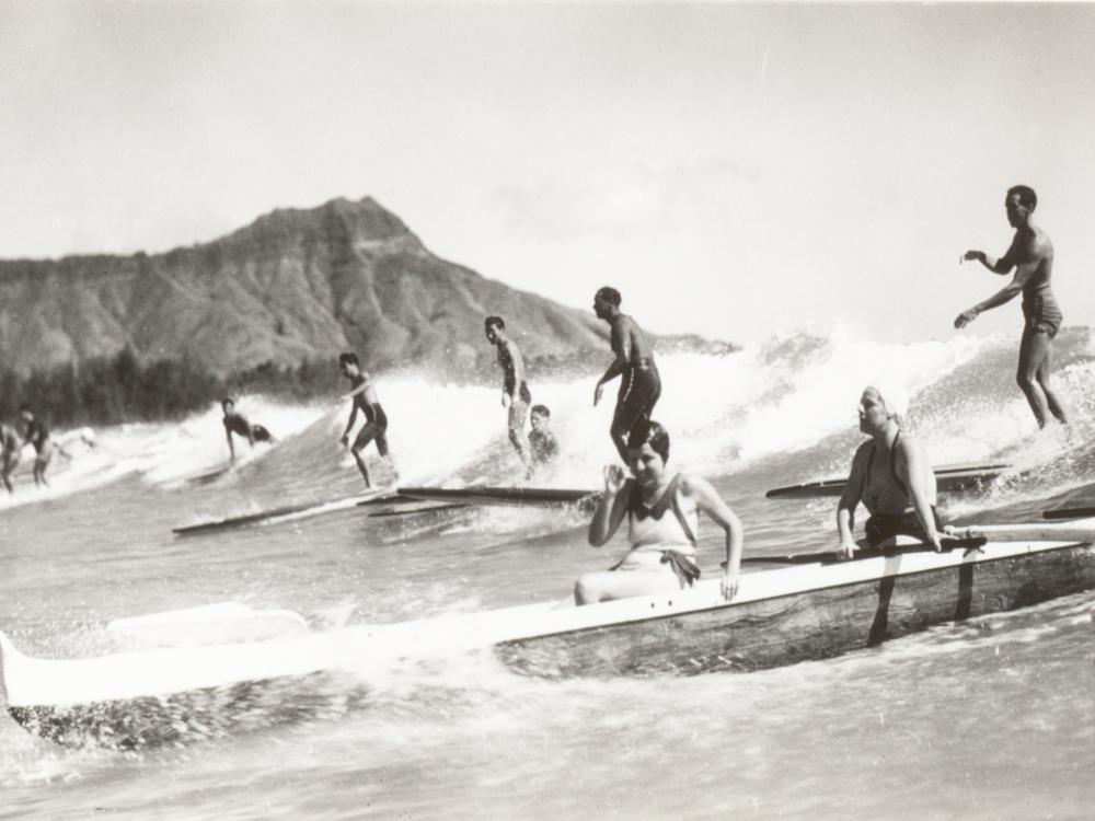 Outrigger Canoe and Surfers