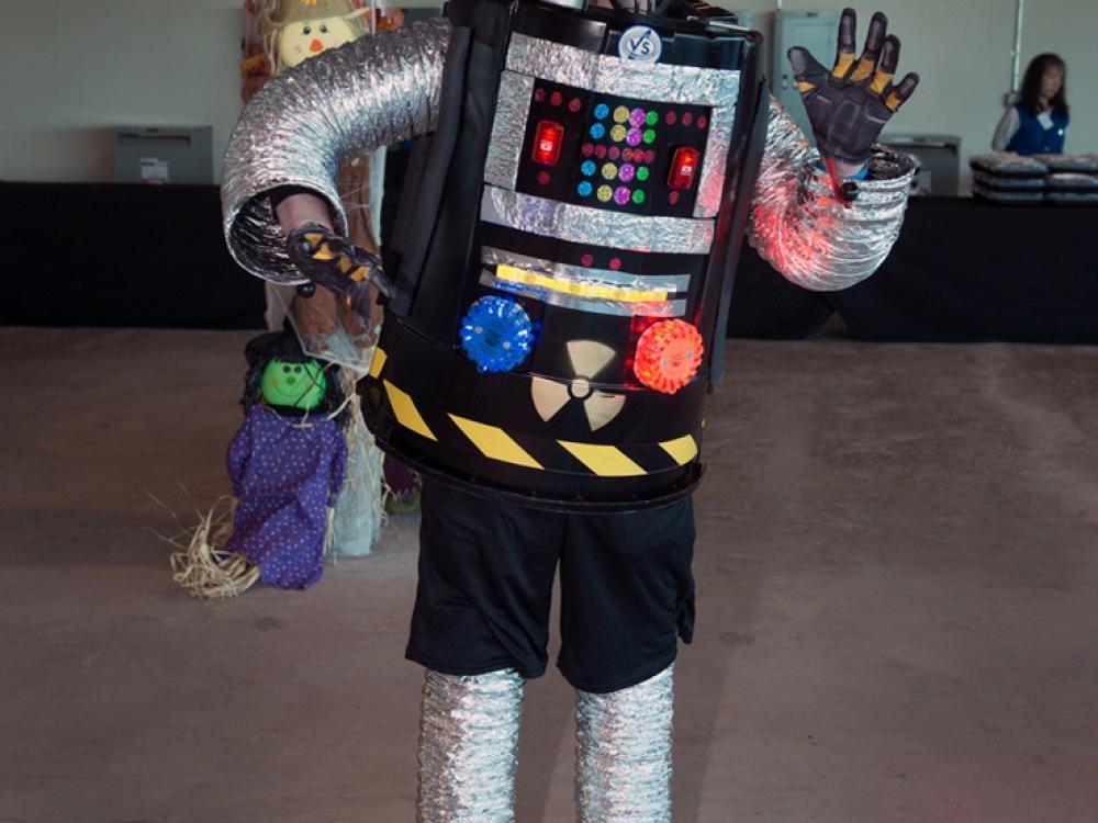 A Museum visitor wears a robot costume at the Museum's annual Halloween event.