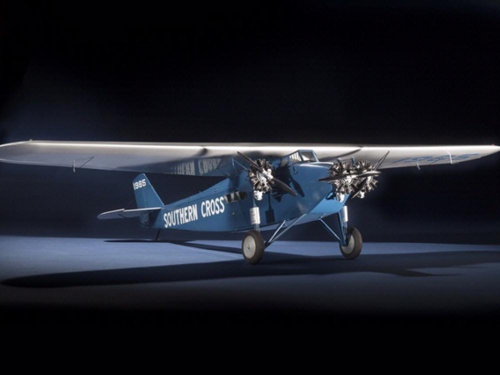 Blue monoplane model with silver-colored underwing and one engine. "Southern Cross" is painted in white on side of the fuselage.