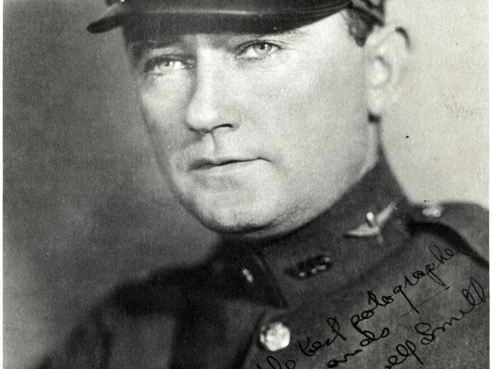 Lowell Smith, a man, poses for a portrait in U.S. Army Air Service uniform.