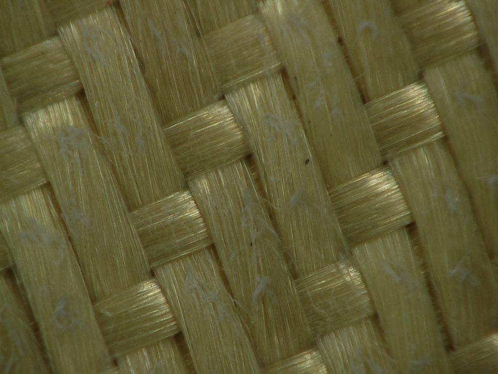 Close-up view of weaved fabric on a thermal mitten.