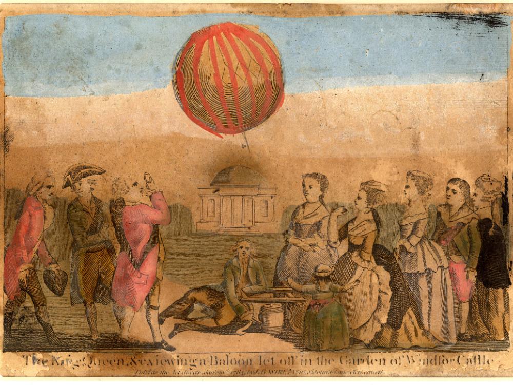 An art print of people, including the King and Queen of England, observing a balloon lifting off at a castle.