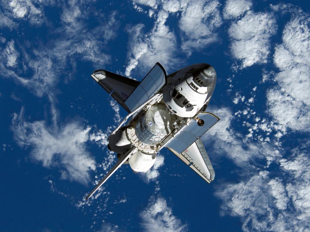 Space Shuttle Discovery Approaches ISS on STS-120 Mission