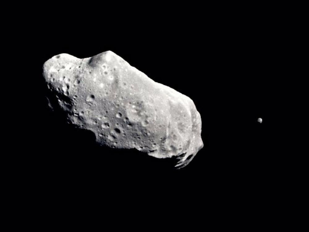 Photo of an asteroid and its satellite moon.