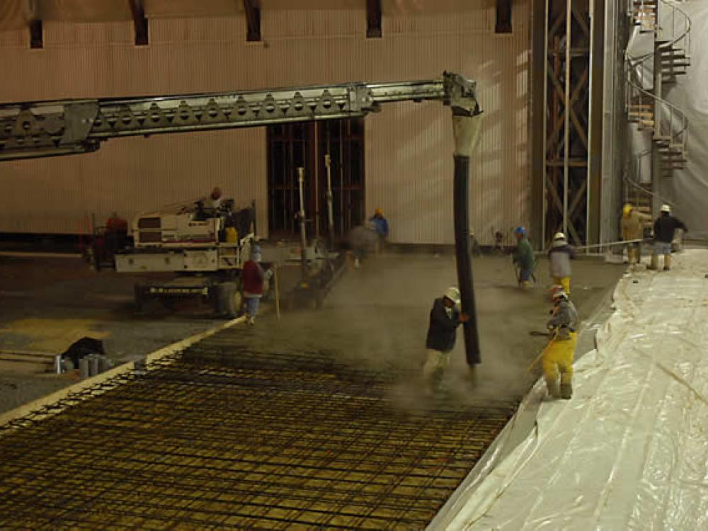 Preparing the floor of the Aviation Hangar