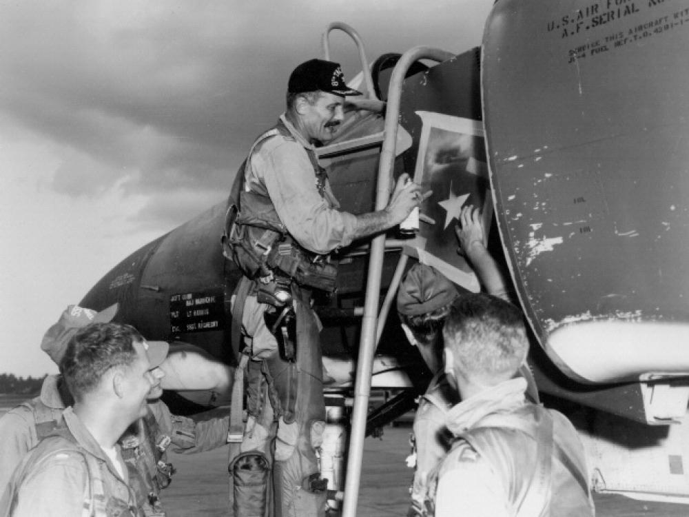 Brig. Gen. Robin Olds Paints Star on Aircraft