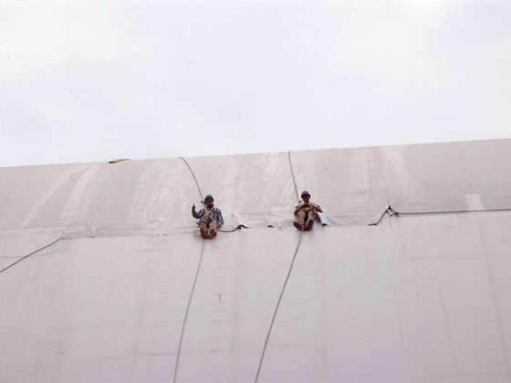 Udvar-Hazy Center roof workers installing Hypalon