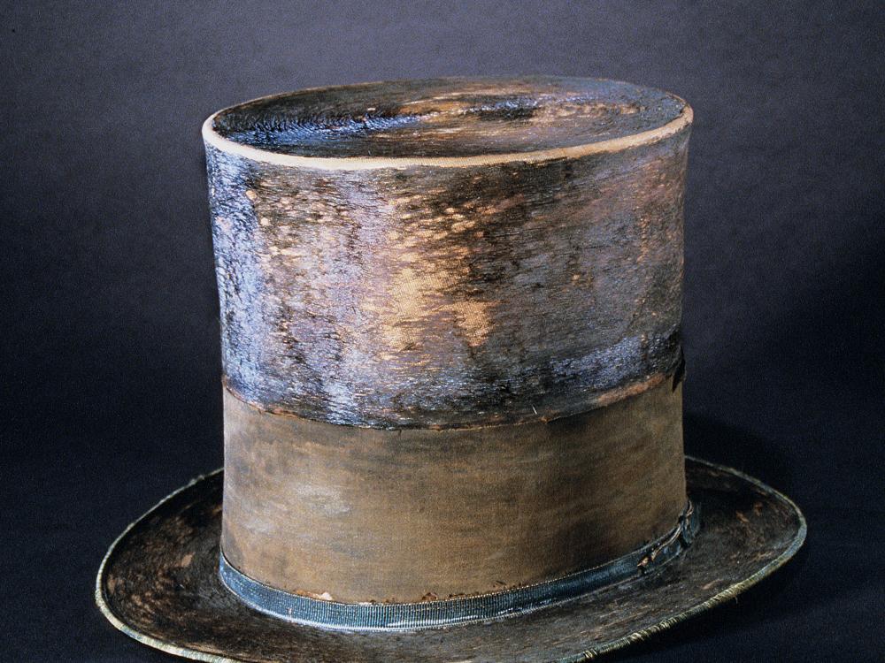 Top hat with aging fabric