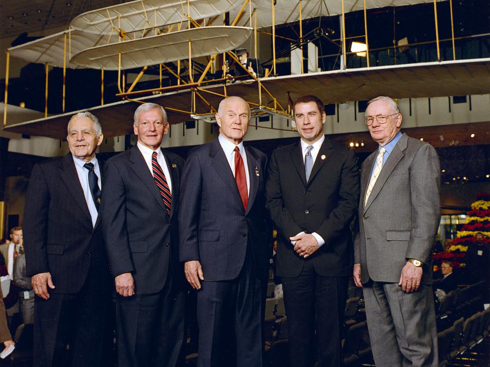 Don Lopez, General John Dailey,  John Glenn, John Travolta, Neil Armstrong