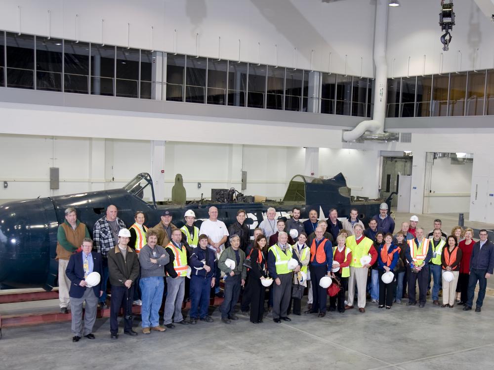 Staff & Supporters Pose in Front of <i>Helldiver</i>