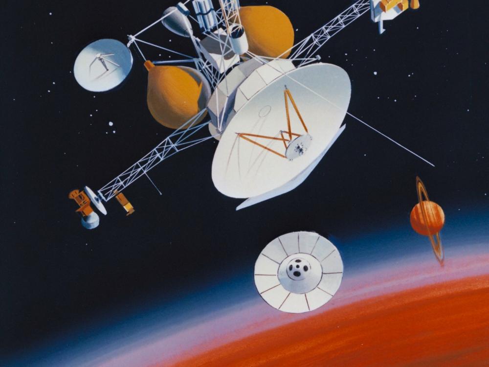 Artwork of the Saturn Orbitor, an uncrewed probe spacecraft, and the Titan Probe spacecraft, a spherical space probe, near Saturn.