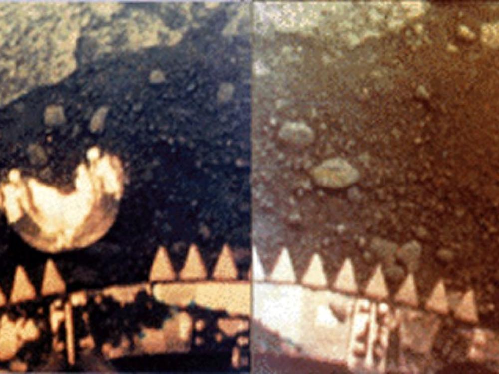 A partial surface image of Venus revealing many rock slabs and soil on the surface.