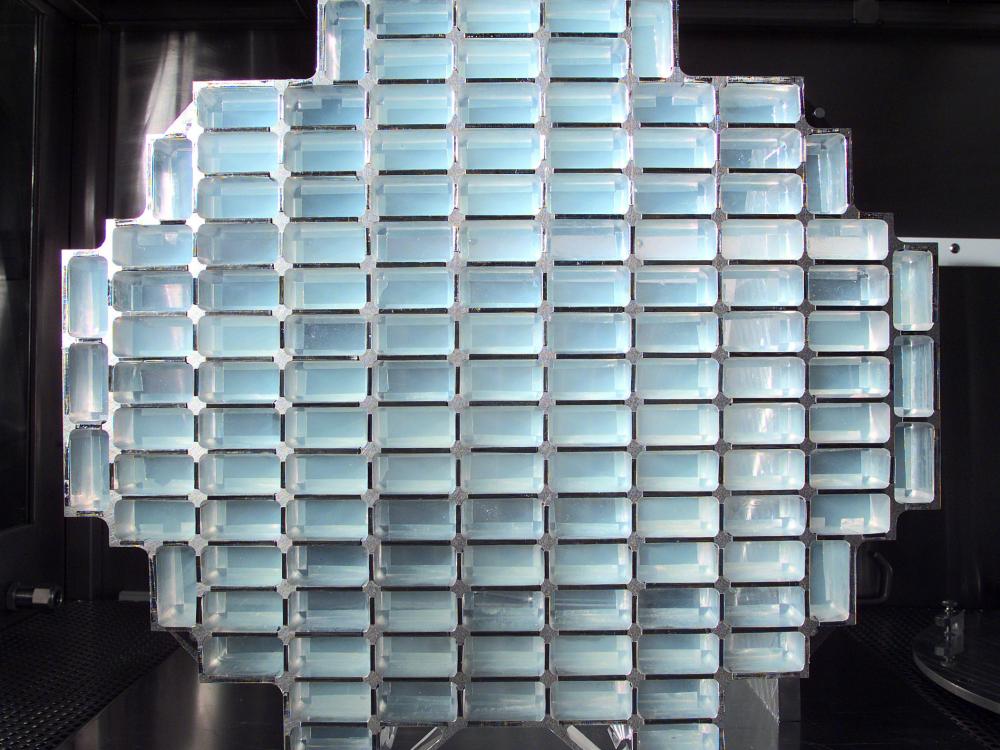 A honeycomb-like structure of rectangular aluminum cells filled with aerogel.