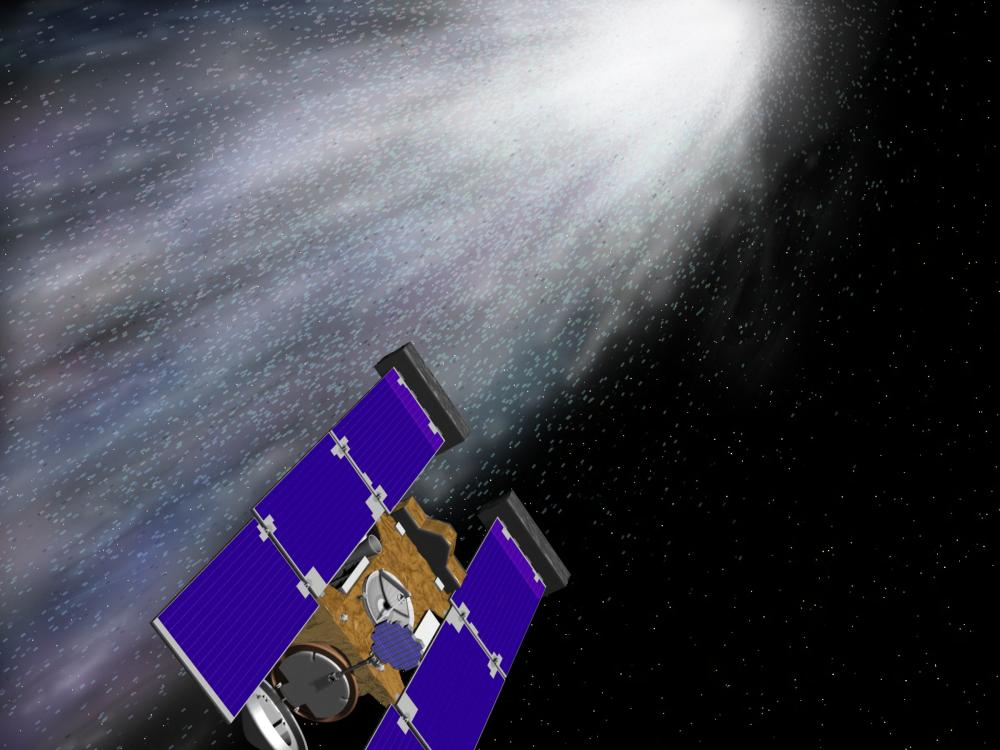 Illustration of the STARDUST space probe retrieving comet particples from a comet.