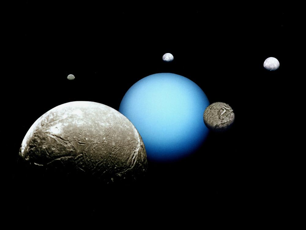 A perspective of Uranus, a blue gas planet, and its five major moons surrounding Uranus.