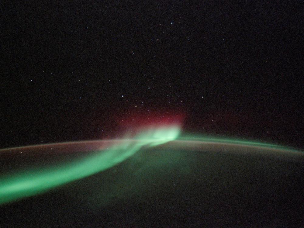 A view of the Aurora Australis, a phenomeon known as "southern lights", from the Space Shuttle Discovery above Earth.