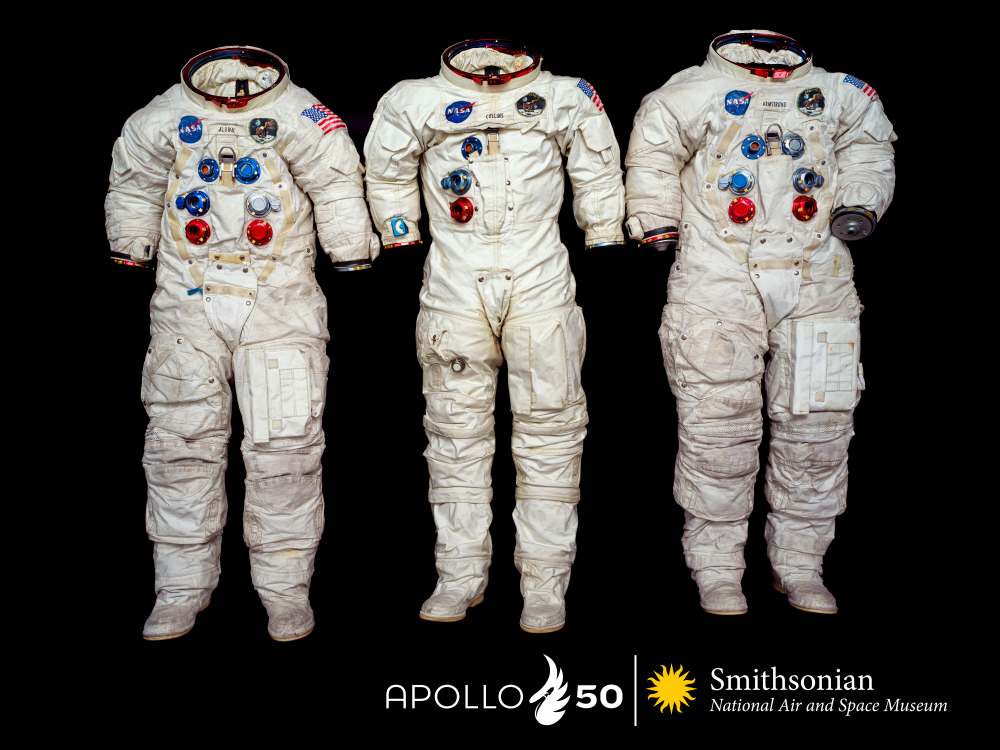 three white Apollo spacesuits