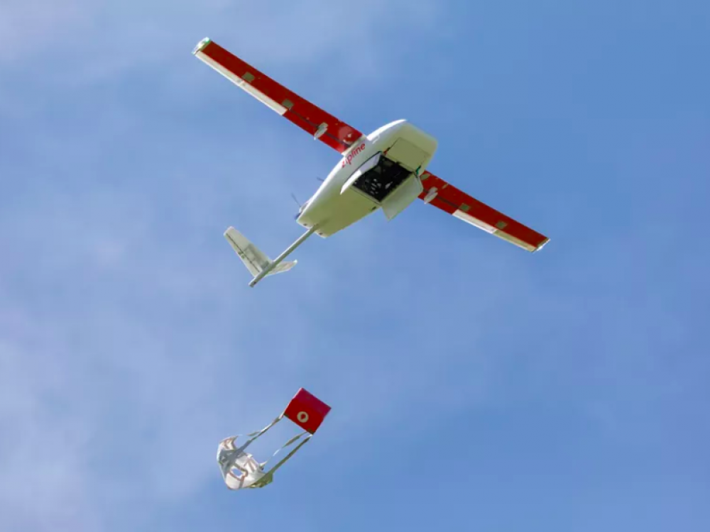 Red "Robin" Zipline drone in flight 