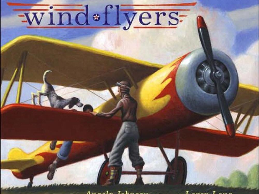 Book cover for a children's book about the Tuskegee Airmen featuring an illustration of a man, his dog, and a child preparing to fly a biplane.