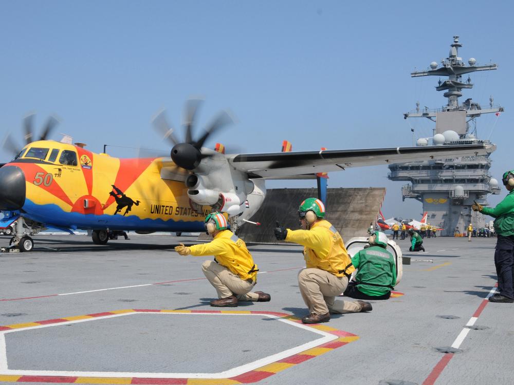 A C-2A Greyhound on an aircraft carrier.