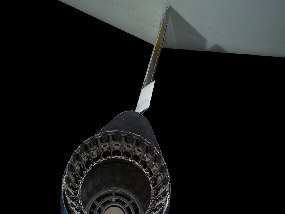 Closeup view of Lockheed F-104A Starfighter aircraft rear exhaust port with tail