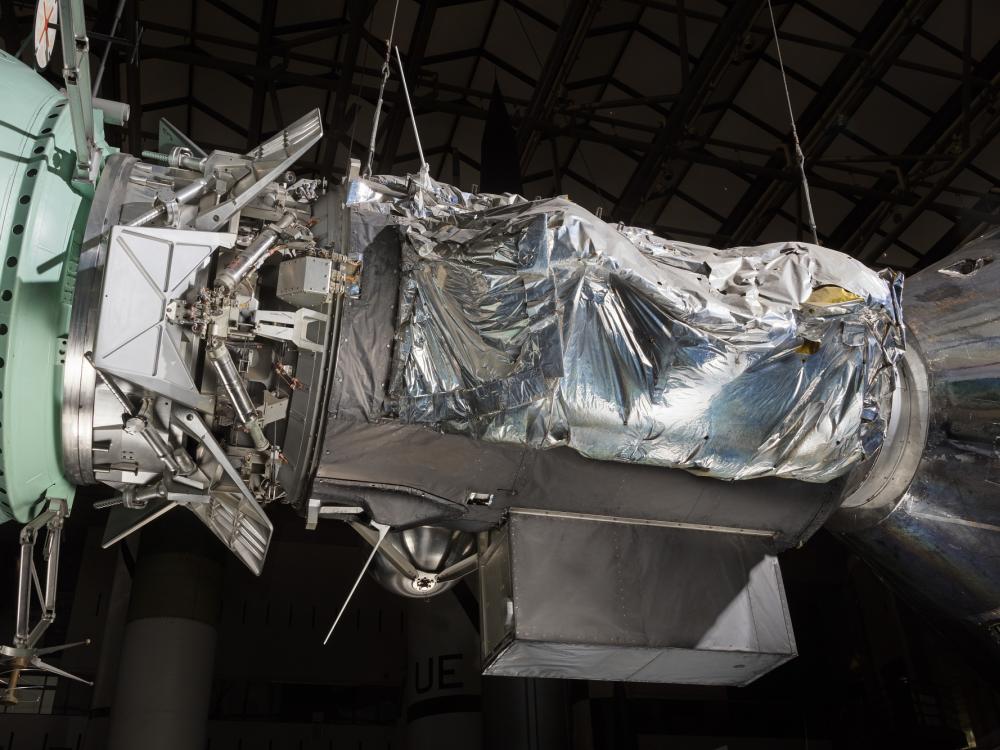 Metal foil on side of Apollo-Soyuz Test Project Backup Docking Module in museum